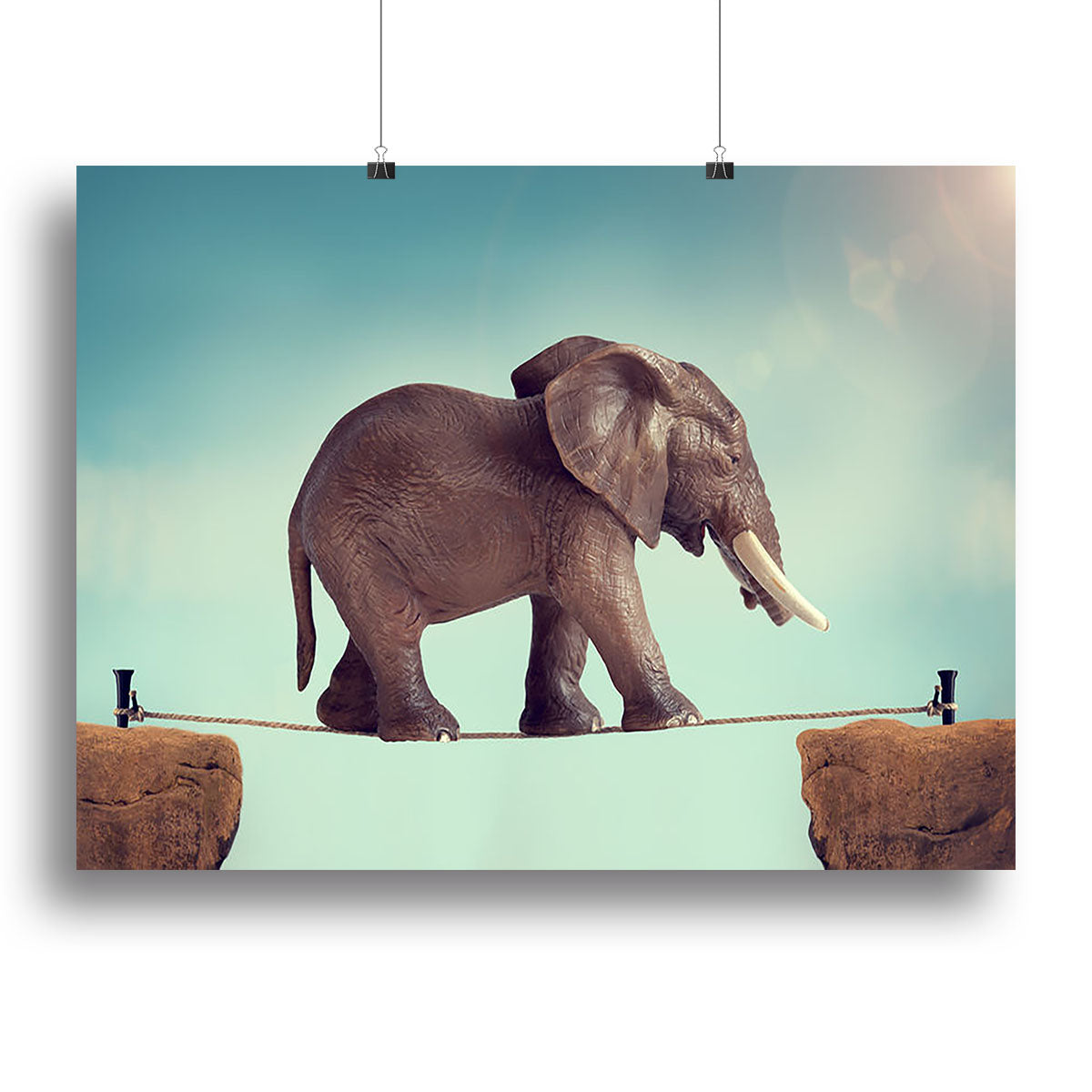 A vibrant canvas print of an elephant balancing on a tightrope, showcasing intricate details and colors.