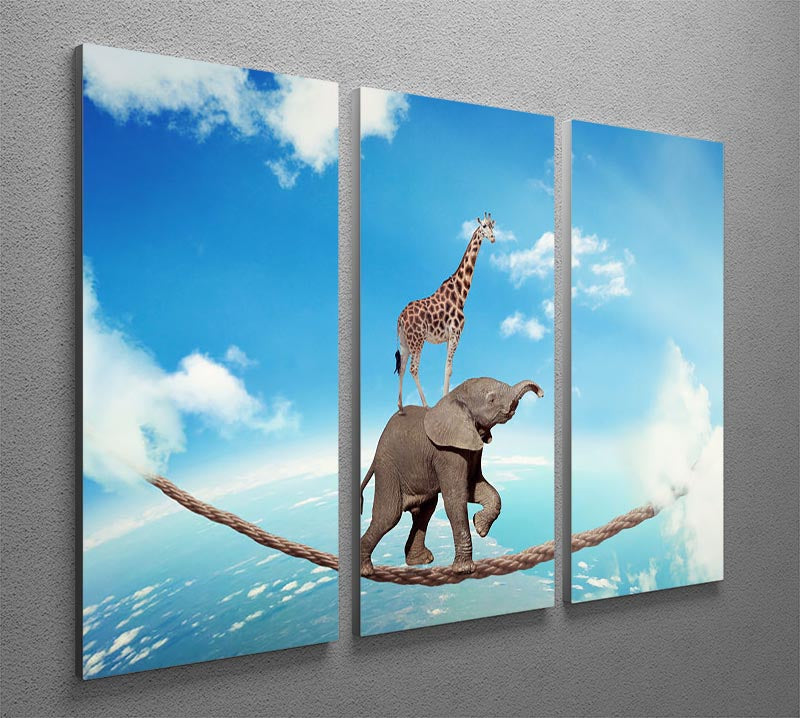A stunning 3-panel canvas art featuring an elephant and giraffe walking on a dangerous rope high in the sky, perfect for home decor.