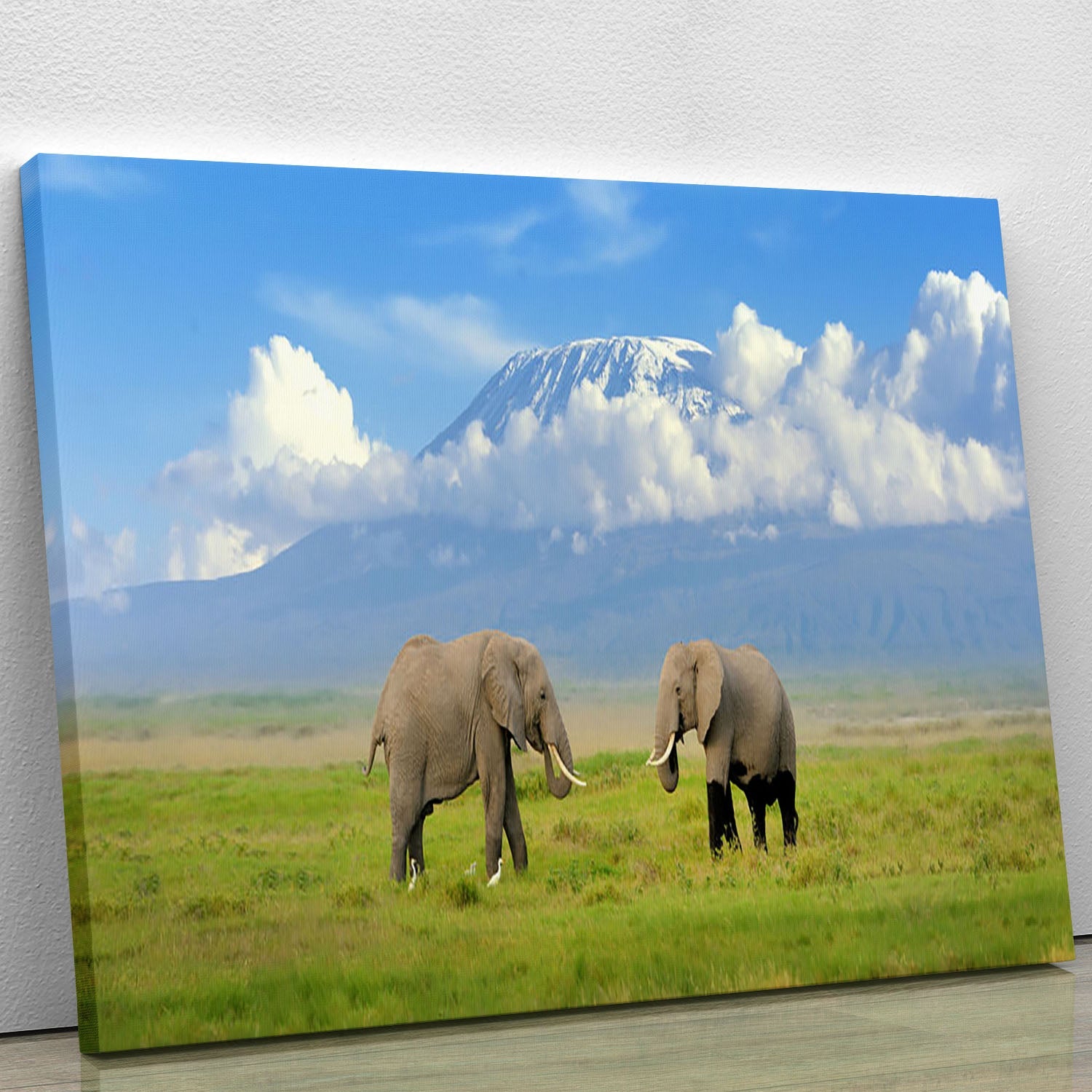 Canvas print featuring an elephant with Mount Kilimanjaro in the background, showcasing vibrant colors and intricate details.