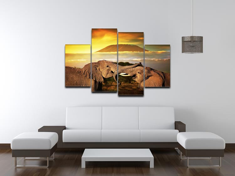 A vibrant 4-split canvas artwork featuring playful elephants interacting with their trunks, showcasing dynamic colors and intricate details.