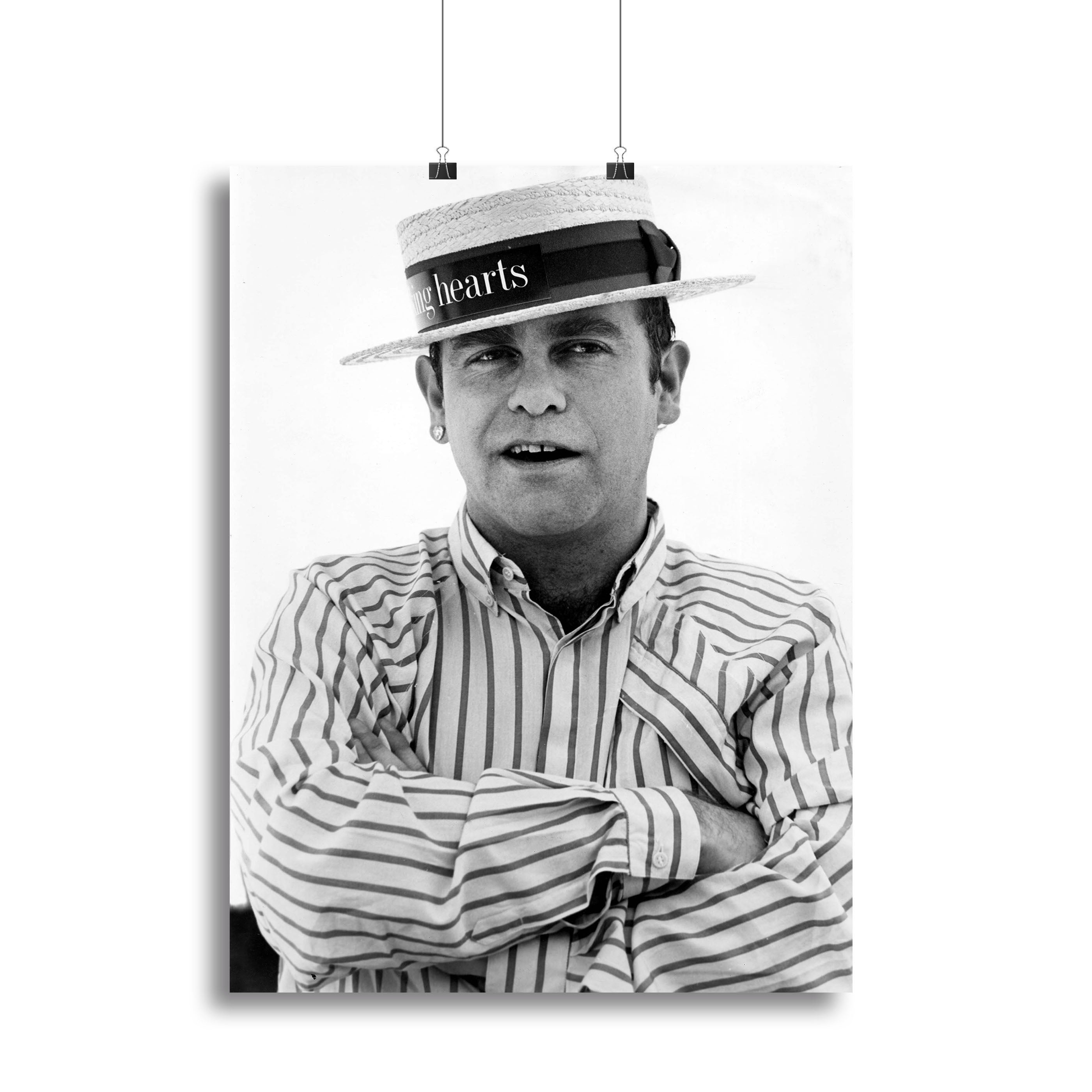 Canvas print of Elton John wearing a straw boater hat, showcasing vibrant colors and iconic style.