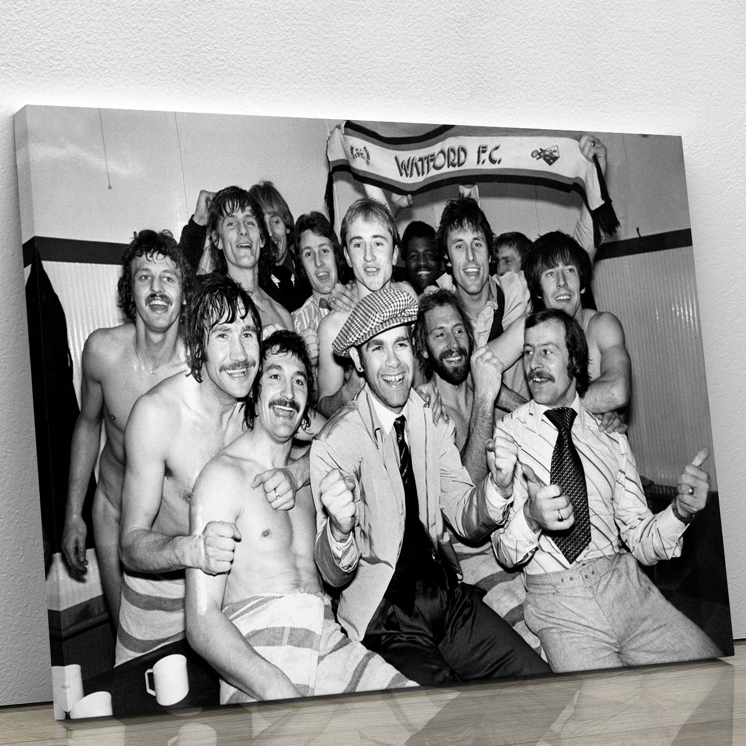 Canvas print featuring Elton John with the Watford football team, showcasing vibrant colors and high-quality design.