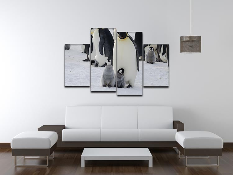 A beautiful 4-split canvas artwork featuring an Emperor penguin parent with its chicks, showcasing a heartwarming family scene.