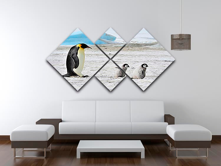 A stunning 4-square canvas artwork featuring an Emperor Penguin with two chicks in the Antarctic, showcasing their natural habitat.