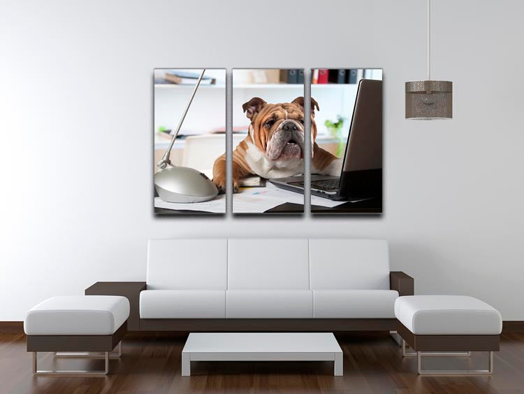 A charming English Bulldog sitting at a desk, depicted in a stunning 3-panel canvas print, perfect for home decor.