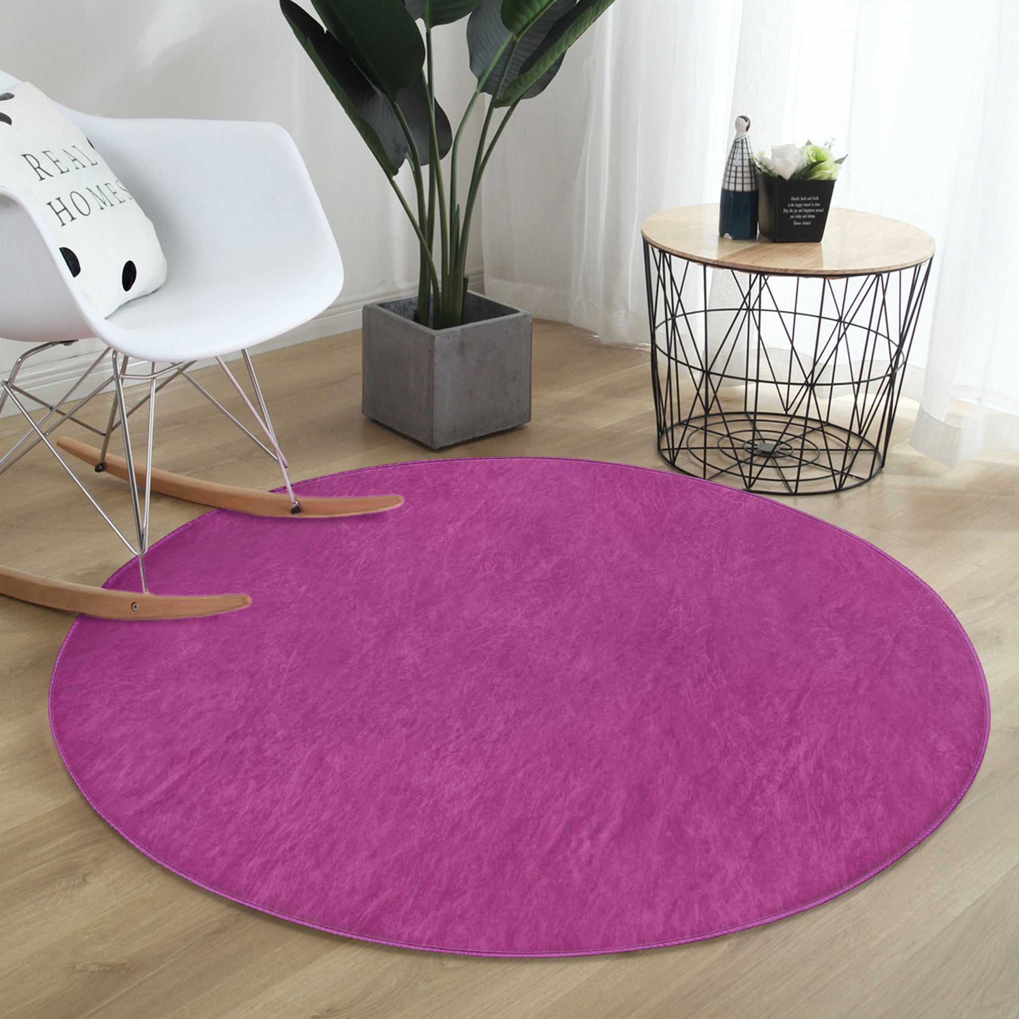 Purple washable circle rug by Homeezone, featuring soft velvet fabric and a vibrant color, perfect for enhancing home décor.