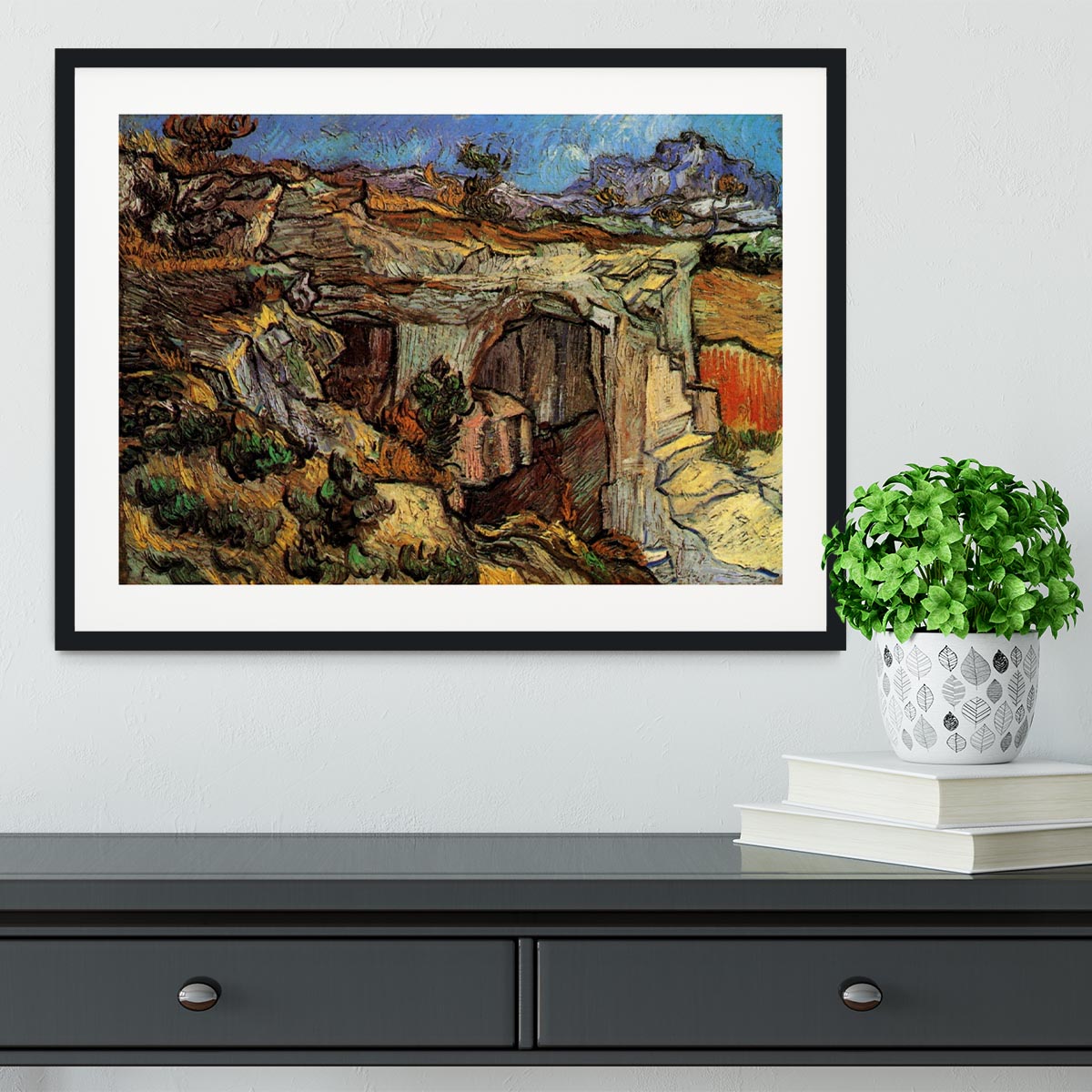Framed print of Van Gogh's Entrance to a Quarry near Saint-Remy, showcasing vibrant colors and dynamic brush strokes.