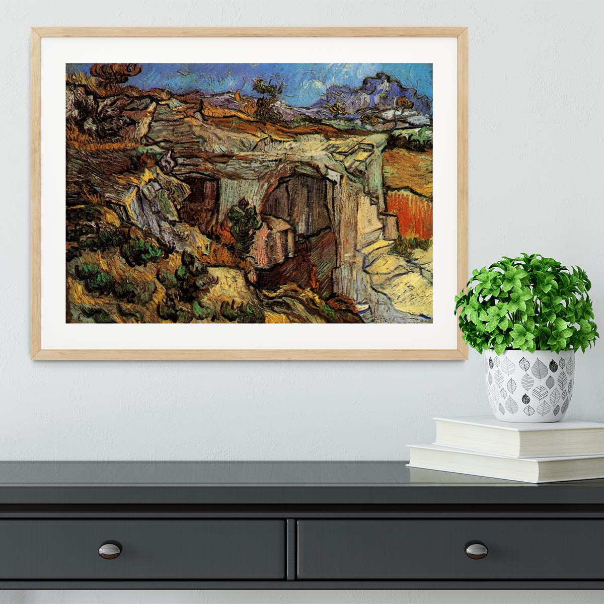 Framed print of Van Gogh's Entrance to a Quarry near Saint-Remy, showcasing vibrant colors and dynamic brush strokes.