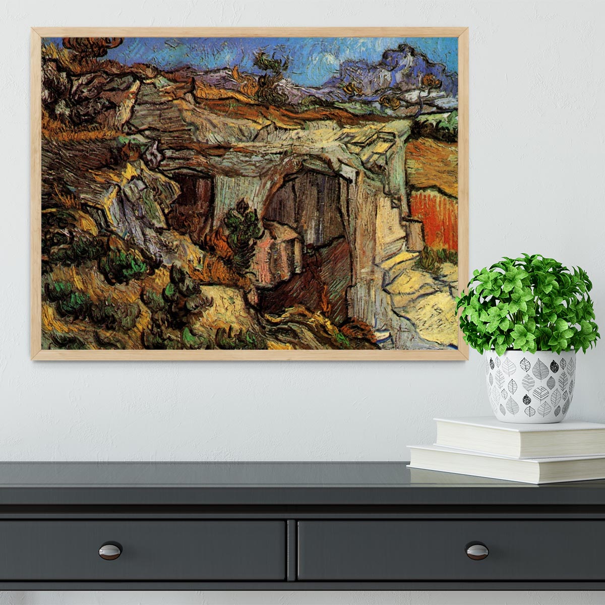 Framed print of Van Gogh's Entrance to a Quarry near Saint-Remy, showcasing vibrant colors and dynamic brush strokes.