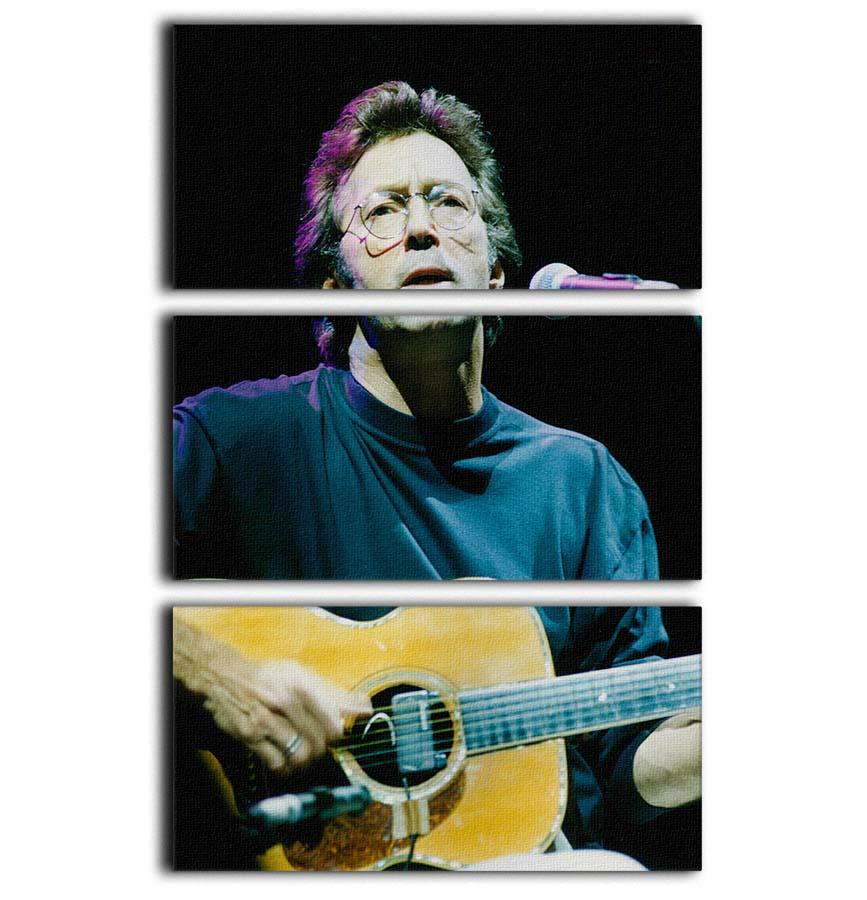 Eric Clapton live 3-panel canvas print showcasing vibrant colors and dynamic performance imagery.