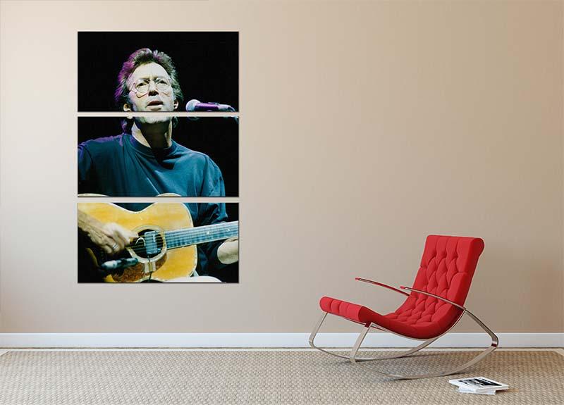 Eric Clapton live 3-panel canvas print showcasing vibrant colors and dynamic performance imagery.