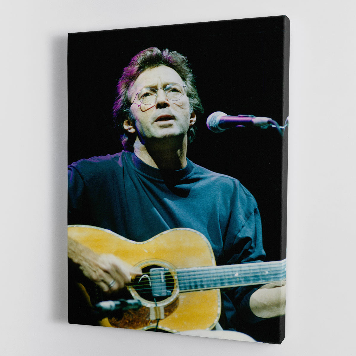 Eric Clapton live canvas print showcasing vibrant colors and intricate details of the legendary guitarist in action.