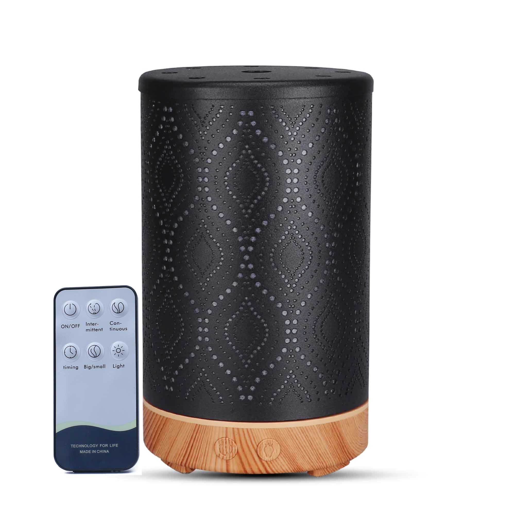 Essential Oil Aroma and Remote Diffuser in black metal with wood grain base, showcasing a modern design and LED lights.