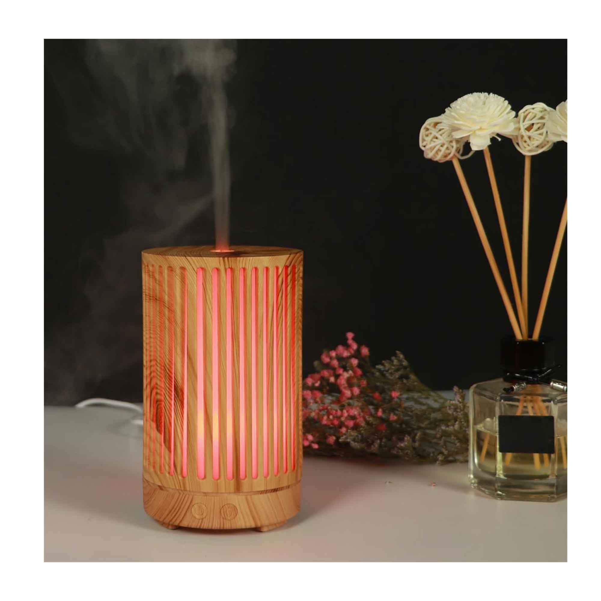 200ml Essential Oil Aroma Diffuser in light wood grain finish with remote control and color changing LED lights.