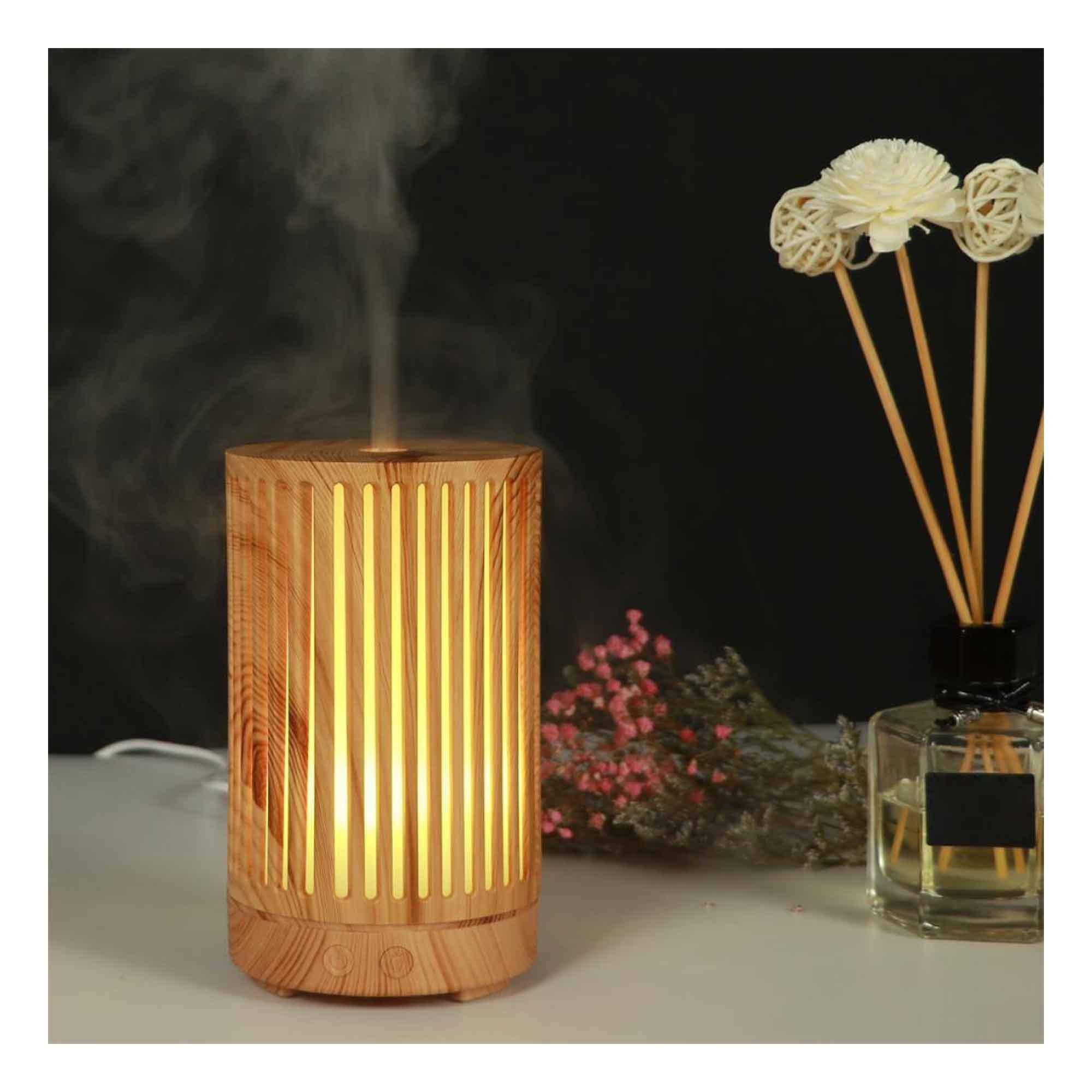 200ml Essential Oil Aroma Diffuser in light wood grain finish with remote control and color changing LED lights.