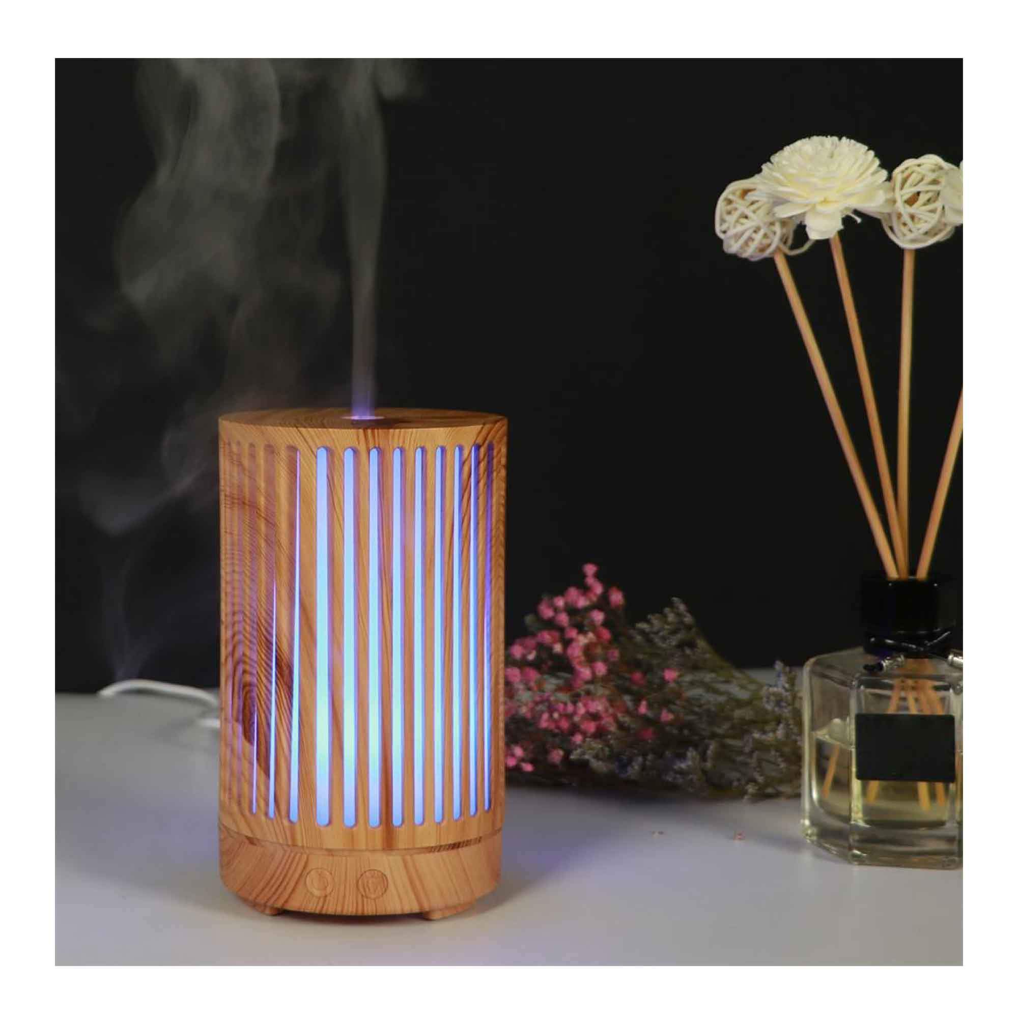 200ml Essential Oil Aroma Diffuser in light wood grain finish with remote control and color changing LED lights.