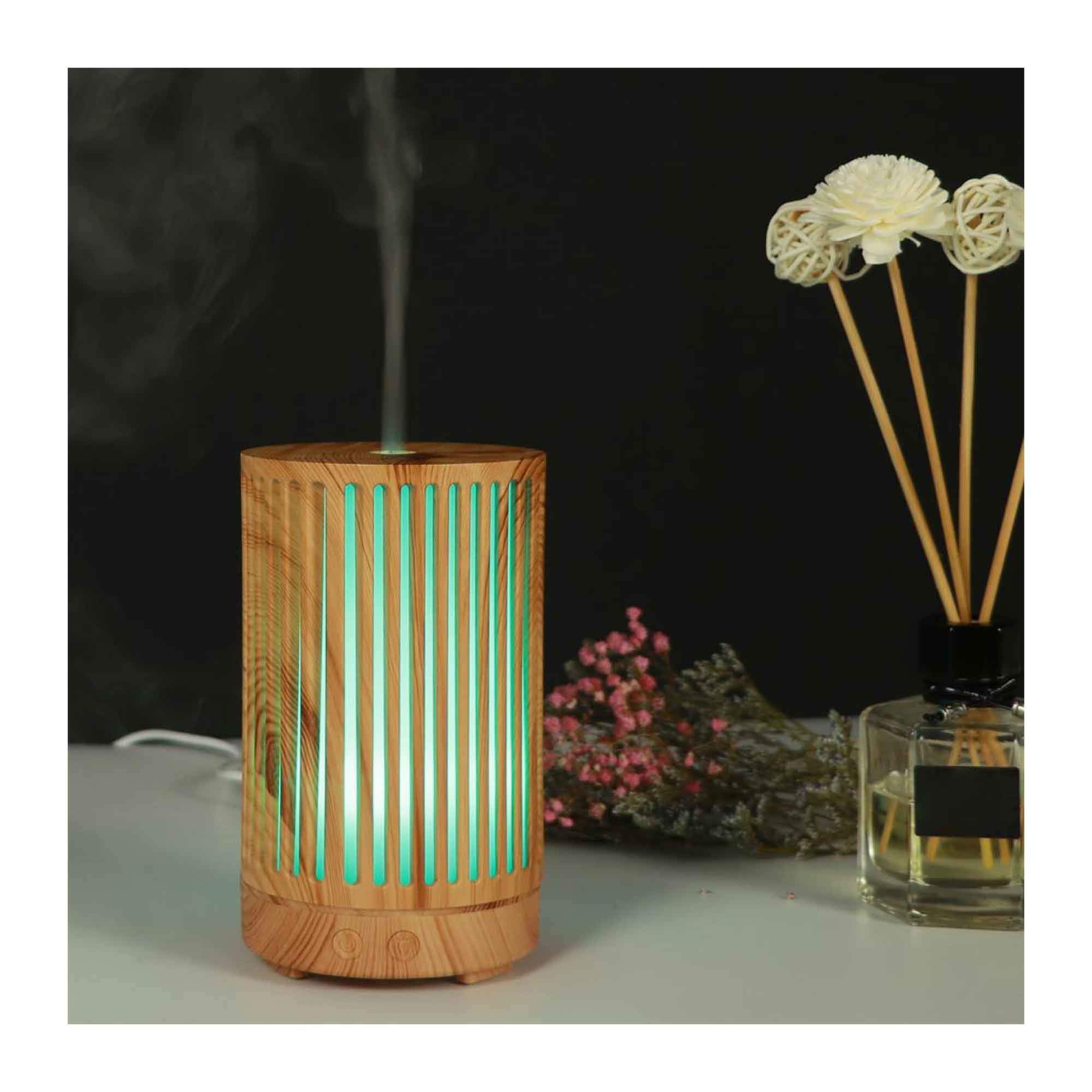 200ml Essential Oil Aroma Diffuser in light wood grain finish with remote control and color changing LED lights.