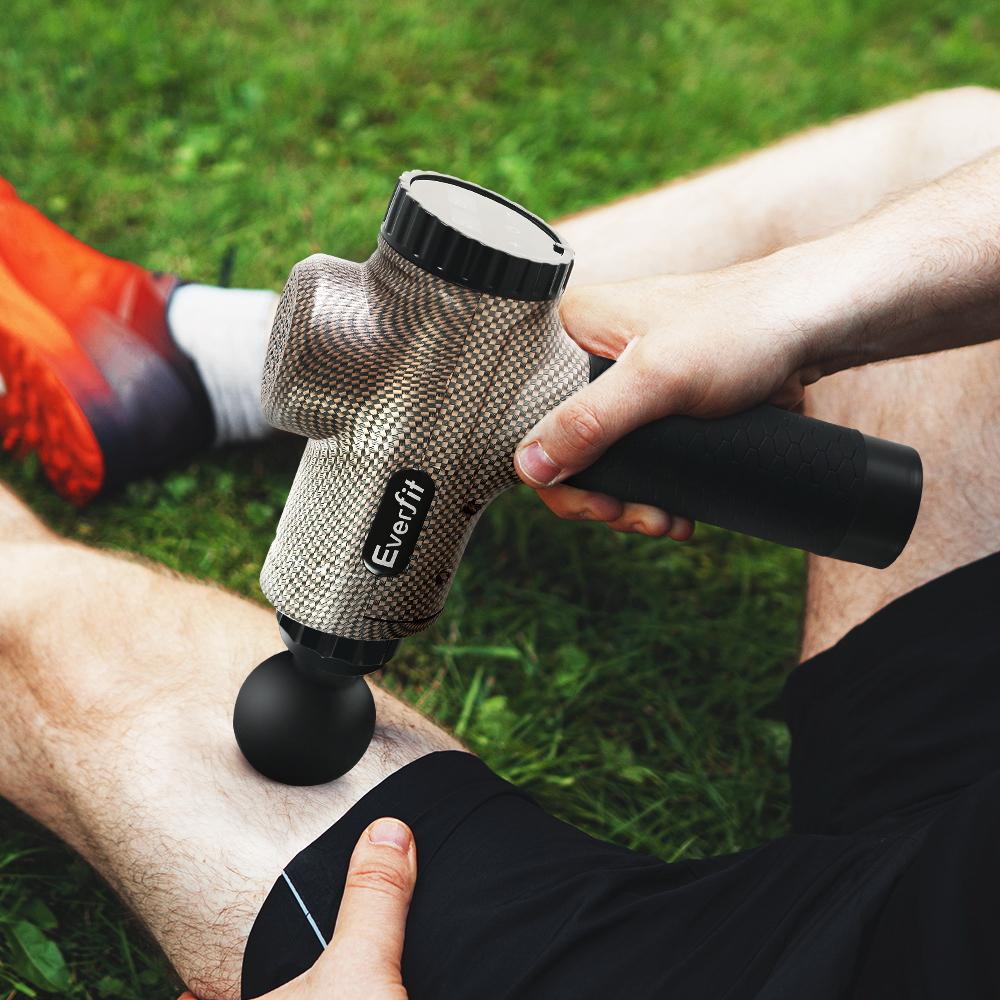 Everfit Massage Gun with 6 interchangeable heads and LCD display, designed for muscle relief and recovery.