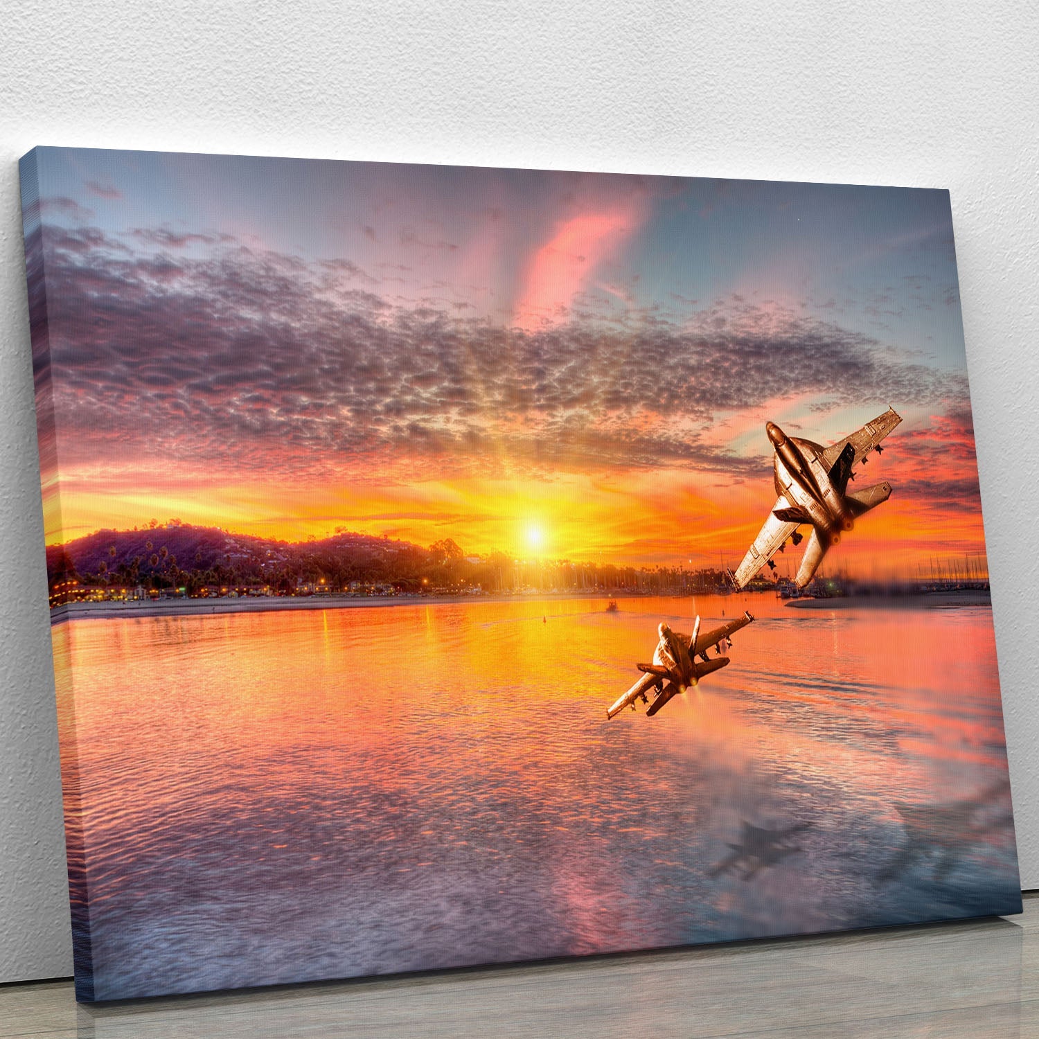 F 18 squadron over the sea canvas print showcasing military jets flying over ocean waves.