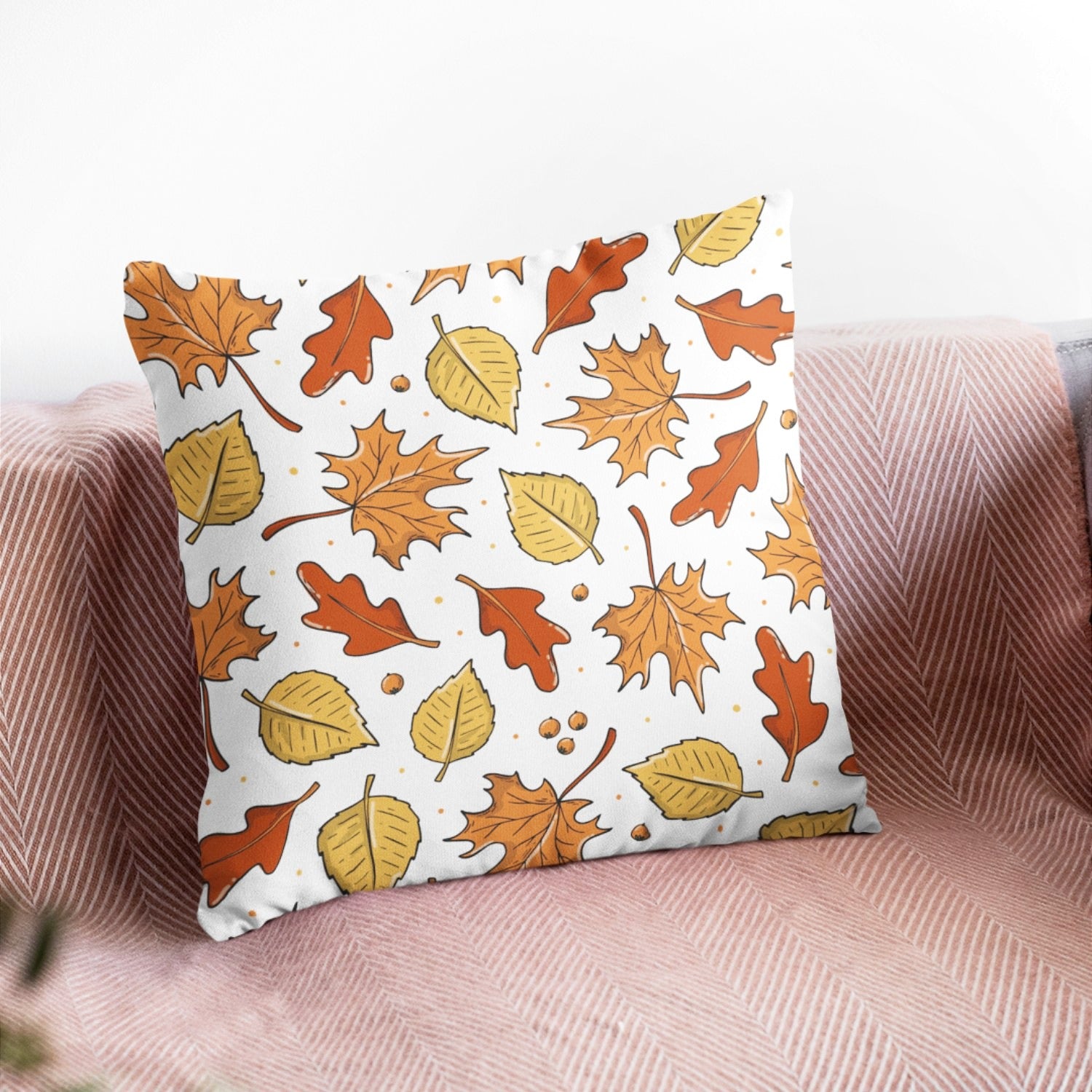 Fall Leaves Pattern Autumn Home Decor Throw Pillow by Homeezone featuring vibrant autumn leaves on one side and light cream back.