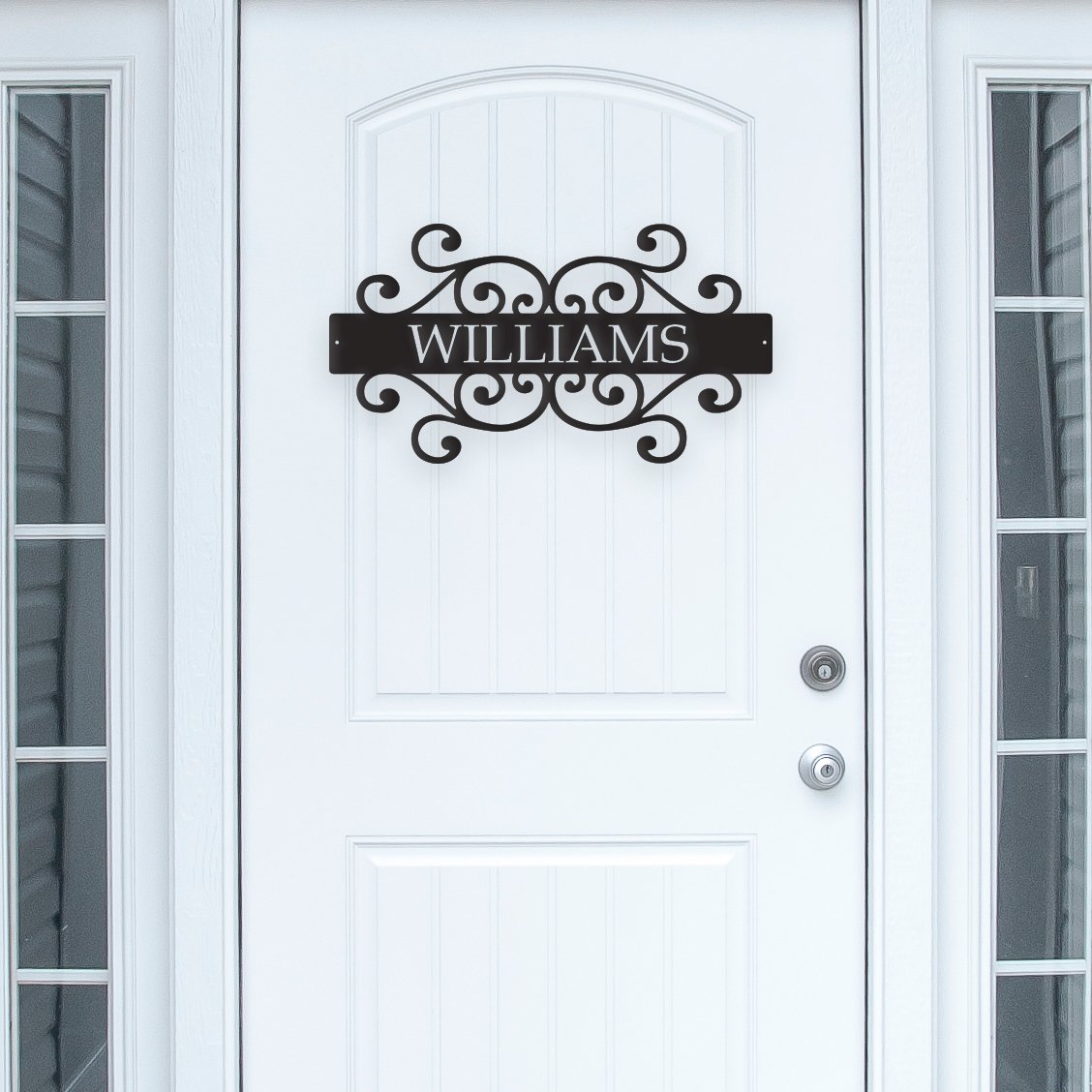 Customizable Family Name Metal Wall Art displayed on a wall, showcasing its elegant design and durable steel construction.