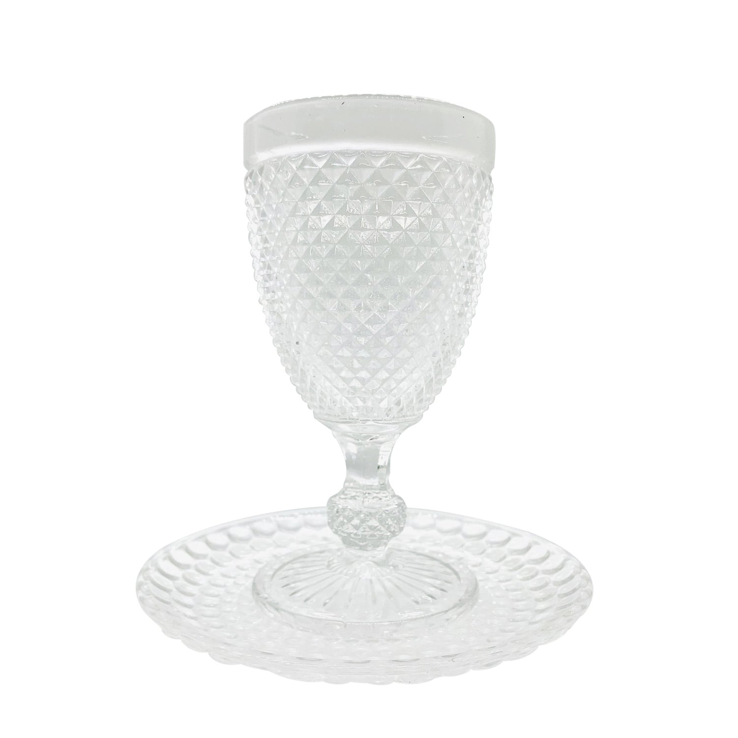 Elegant Kiddush glass with intricate decorations and matching under plate, perfect for Shabbat and special occasions.