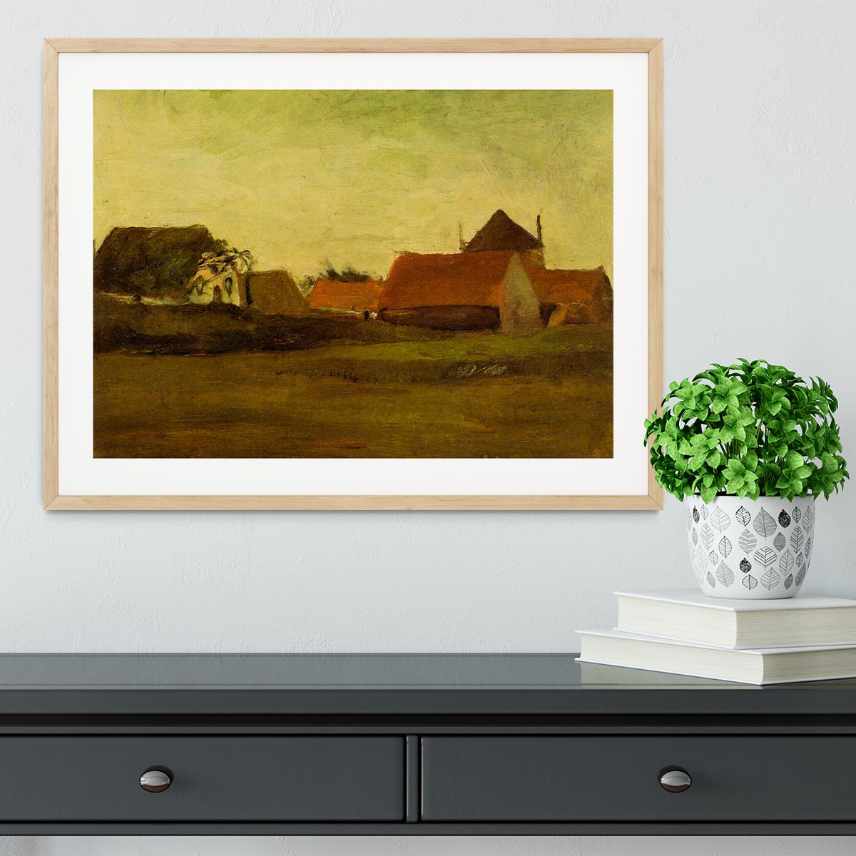 Framed artwork of Van Gogh's Farmhouses in Loosduinen, showcasing vibrant colors and intricate details.