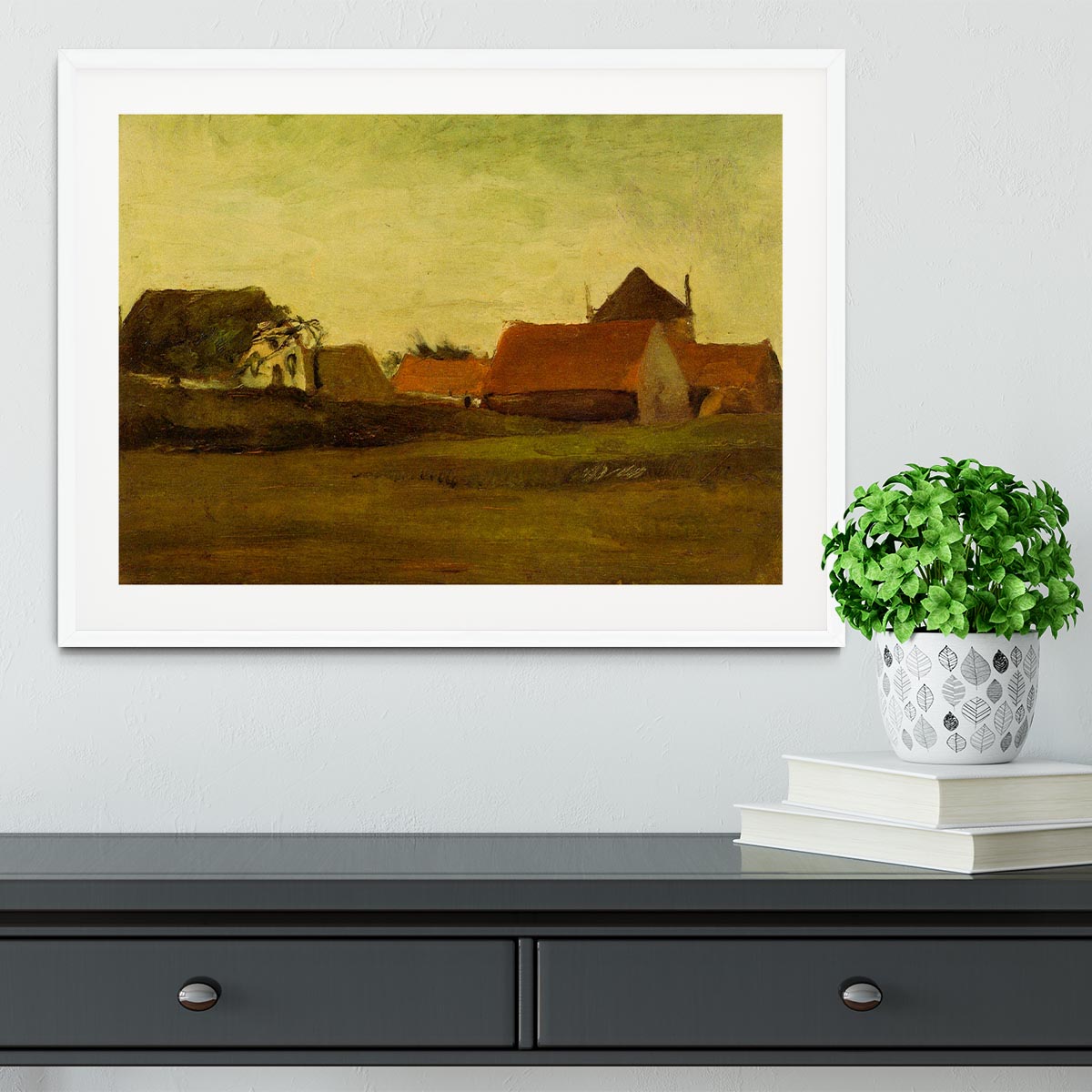 Framed artwork of Van Gogh's Farmhouses in Loosduinen, showcasing vibrant colors and intricate details.