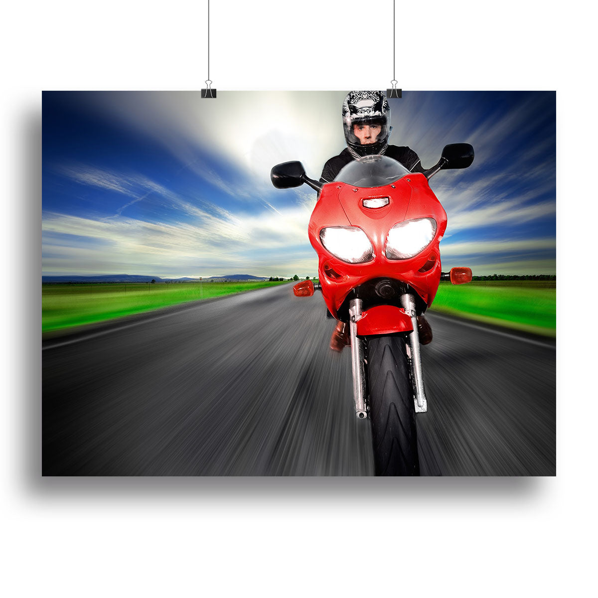 A vibrant canvas print featuring a fast red motorbike, showcasing dynamic design and bold colors, perfect for home or office decor.