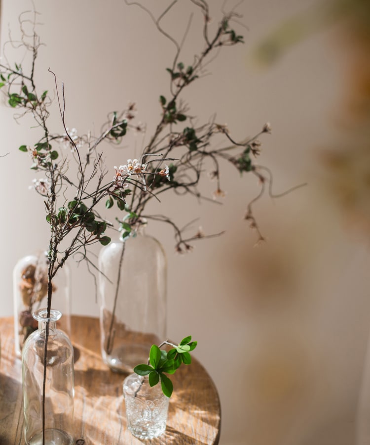 Faux Artificial Colorful Baby's-Breath Vine Stem, 27 inches tall, featuring vibrant blue, pink, white, and yellow flowers for elegant decor.