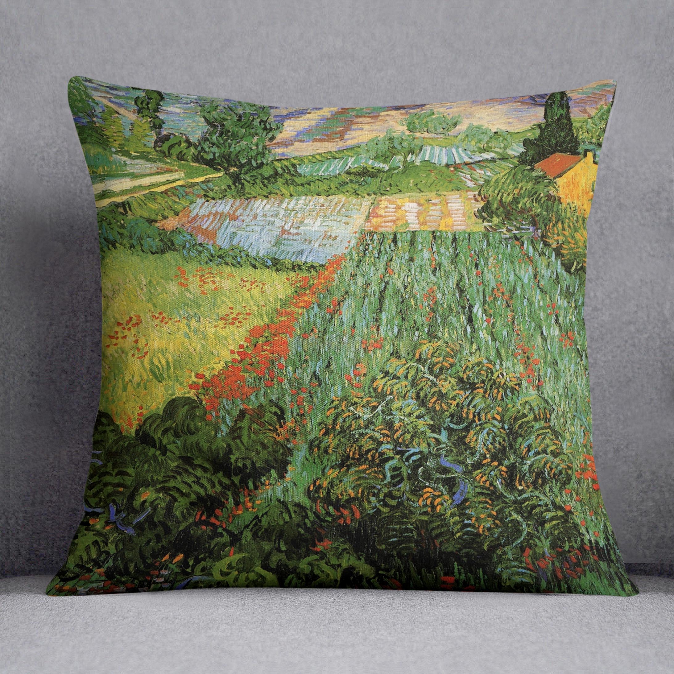 A vibrant cushion featuring Van Gogh's Field with Poppies design, made from luxurious vegan faux suede.