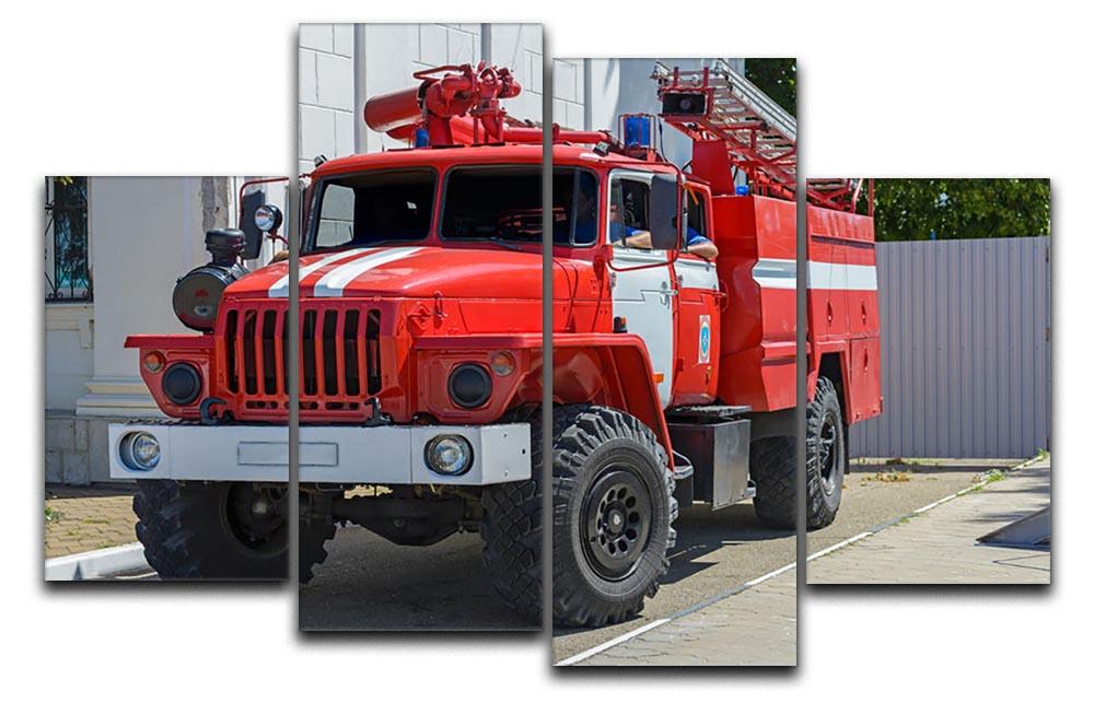 A vibrant 4-panel canvas artwork depicting a fire truck in an urban setting, showcasing dynamic colors and details.