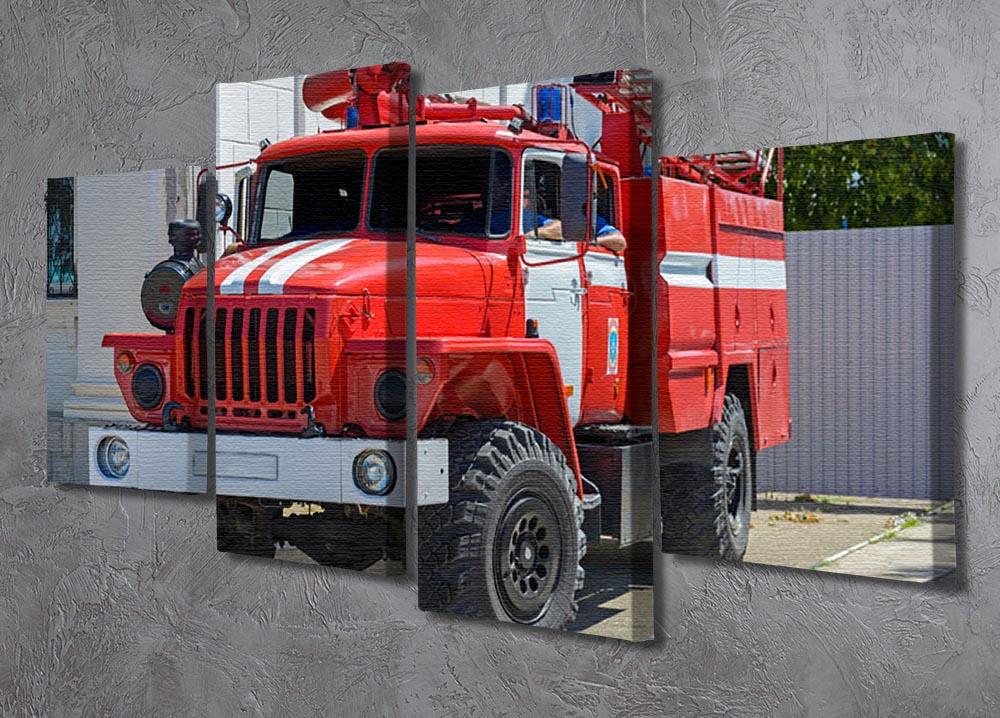 A vibrant 4-panel canvas artwork depicting a fire truck in an urban setting, showcasing dynamic colors and details.