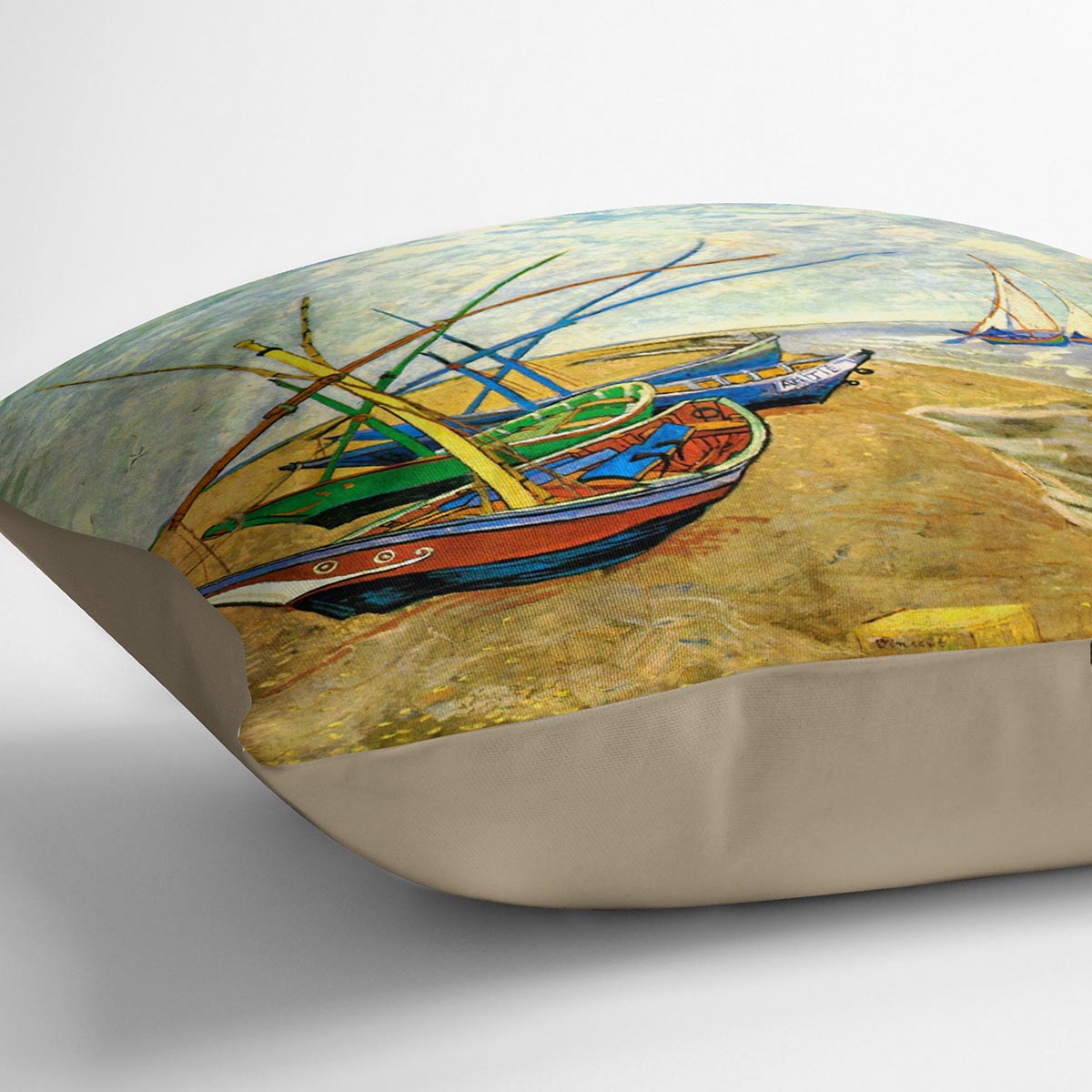 A vibrant cushion featuring Van Gogh's Fishing Boats on the Beach artwork, made from luxurious vegan faux suede.