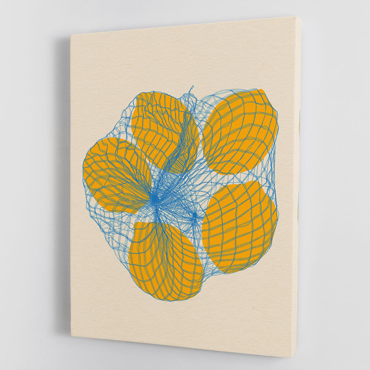 Canvas print featuring five vibrant lemons in a net bag, showcasing bright colors and detailed textures.