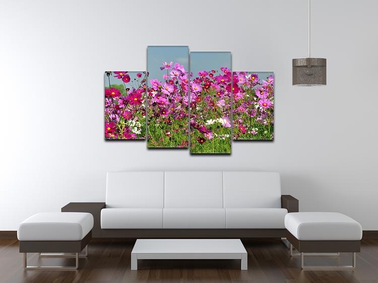 A vibrant 4-split canvas artwork featuring a colorful flower field under a bright blue sky, ideal for home decor.