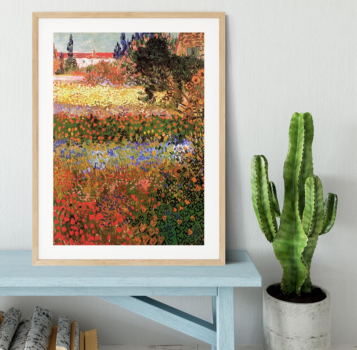 Framed print of Van Gogh's Flowering Garden, showcasing vibrant colors and quality craftsmanship in a stylish frame.