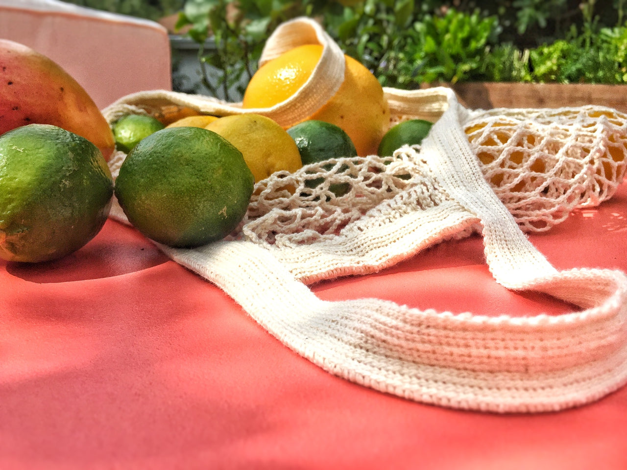 A stylish French Market Tote made of durable cotton string, showcasing its expandable design and natural color, perfect for shopping and travel.