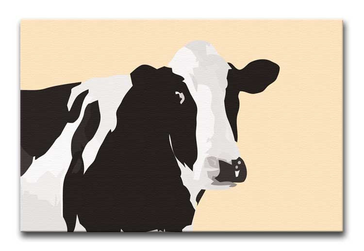 A vibrant Fresian Cow pop art canvas print showcasing bold colors and artistic design, perfect for modern home decor.