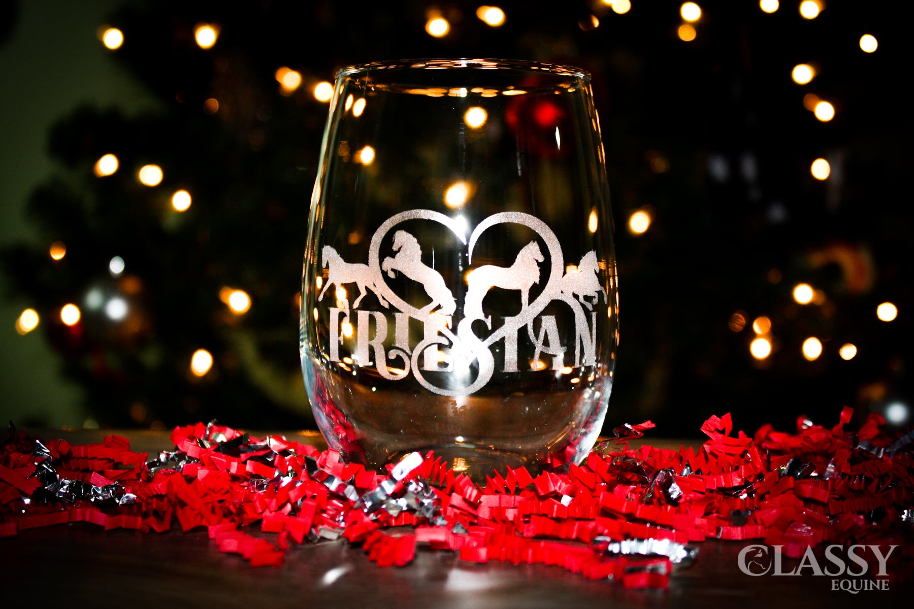 Elegant stemless wine glasses featuring a Friesian horse heart design, perfect for wine lovers.