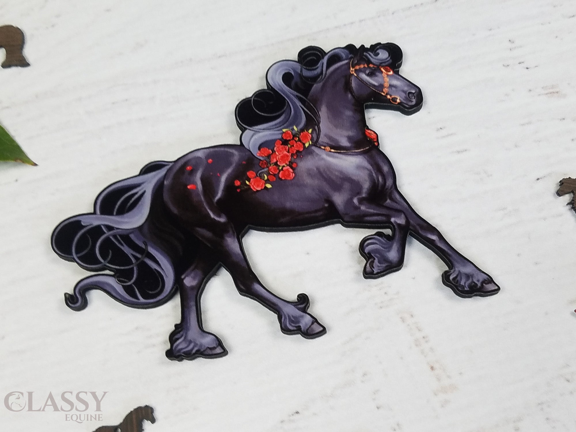 Friesian Horse Ornament III featuring a black horse with red and gold decorations, made from composite wood, perfect for hanging.