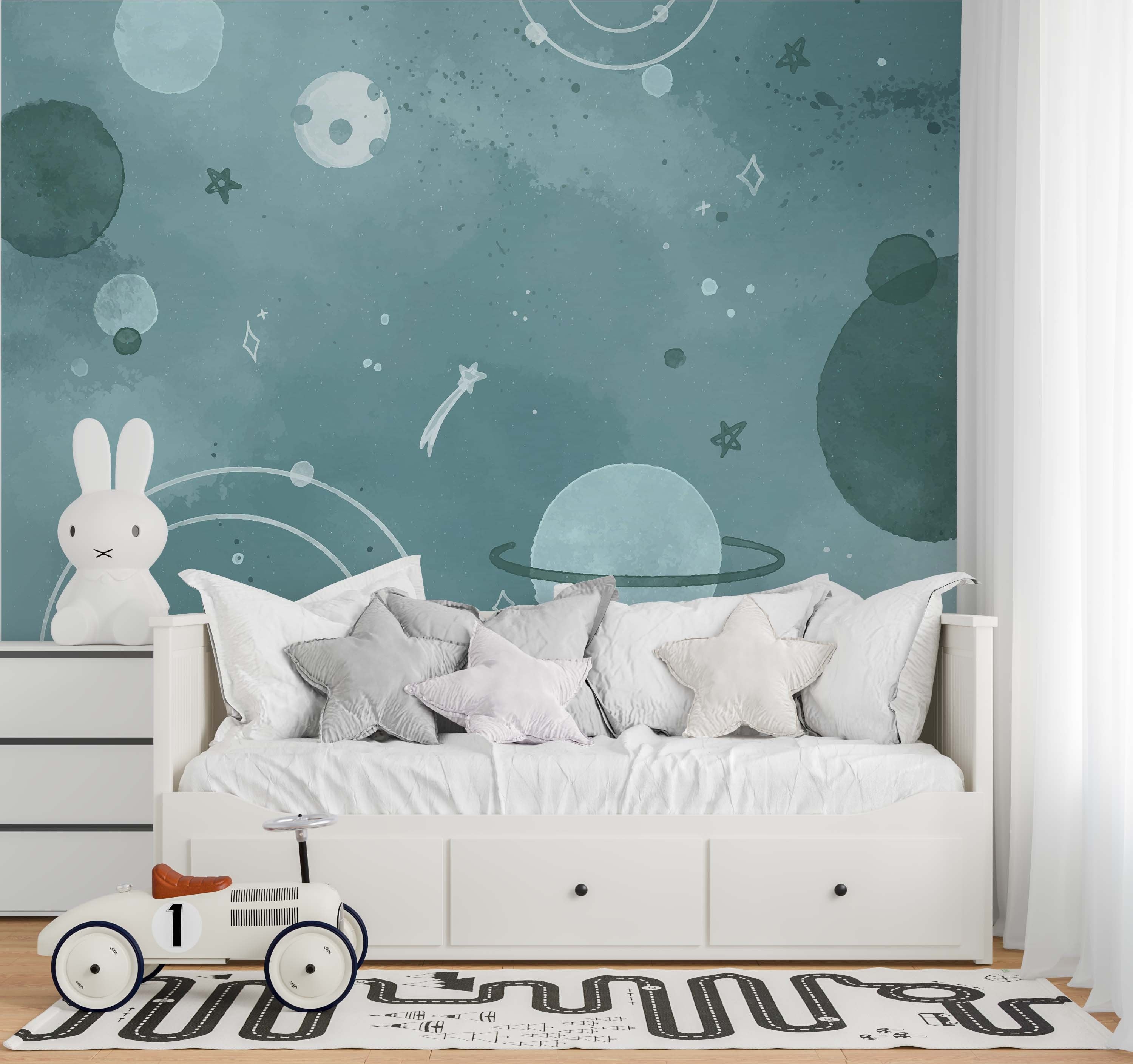 A vibrant Galaxy Wall Mural featuring stars, planets, and cosmic elements, designed for children's rooms.