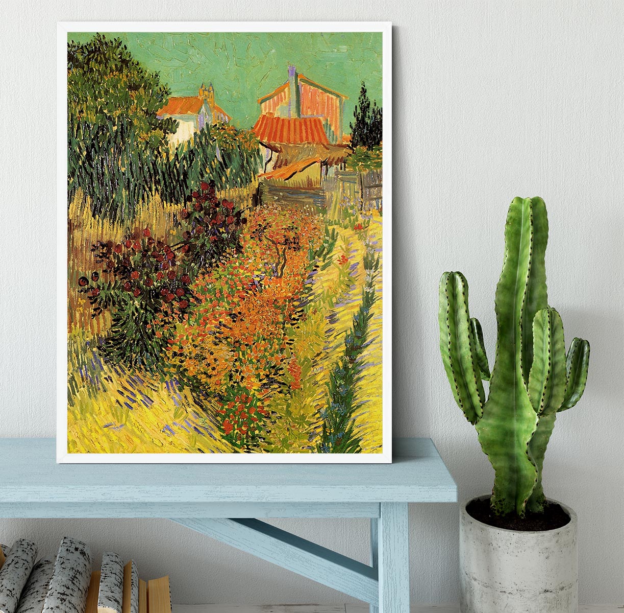 Framed print of Van Gogh's Garden Behind a House, showcasing vibrant colors and intricate details in a stylish frame.