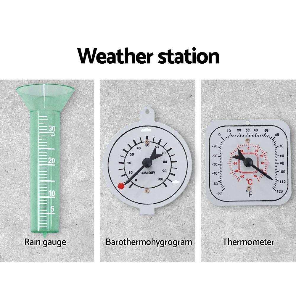 8FT Garden Windmill with grey blades and red trims, featuring a weathervane and sturdy metal frame, set in a backyard.