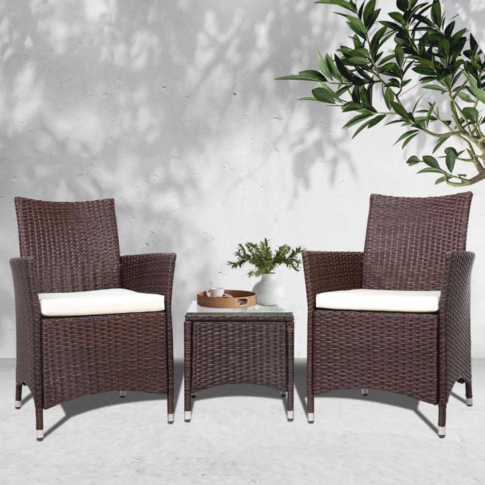 Gardeon 3 Piece Wicker Outdoor Furniture Set in Brown featuring two sofas and a glass top side table, perfect for outdoor relaxation.