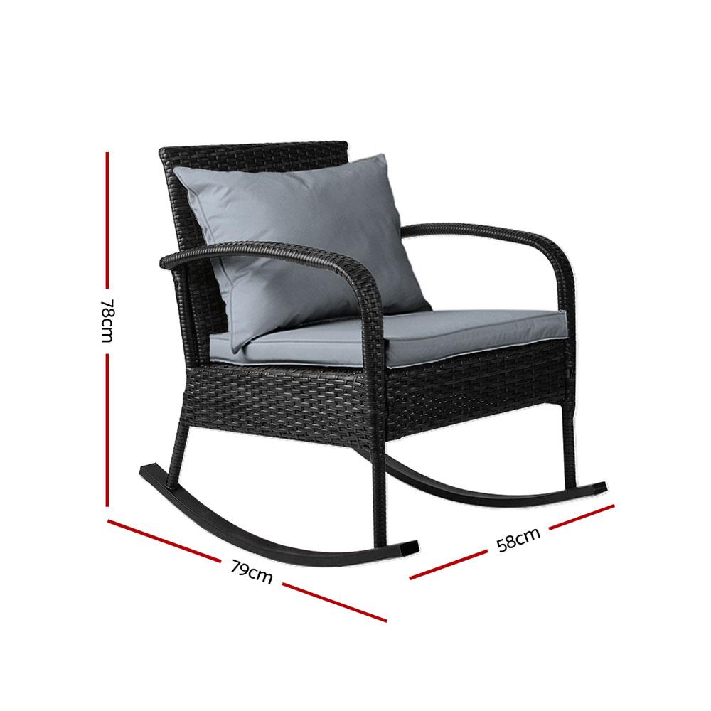 Gardeon Outdoor Rocking Chair in black wicker with grey cushions, set in a garden patio environment, showcasing its elegant design and comfort.