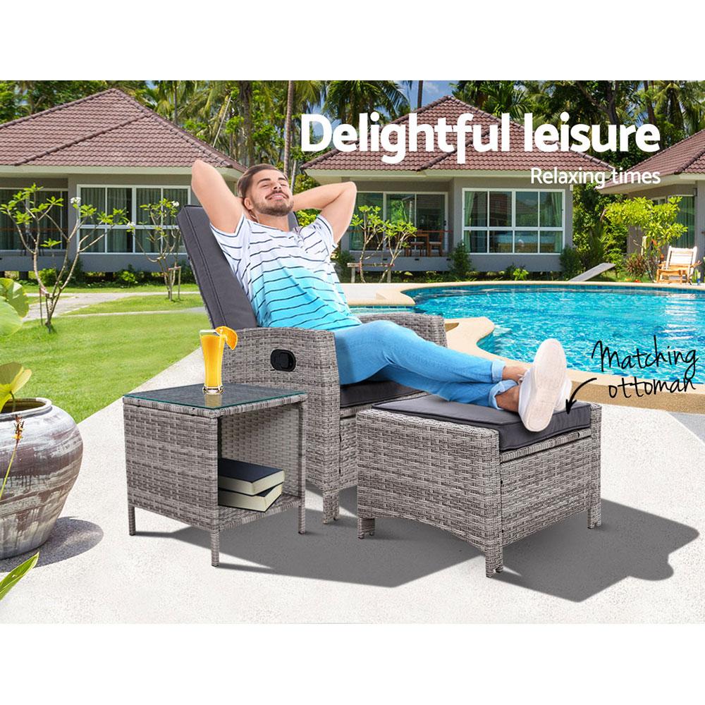 Gardeon Outdoor Wicker Recliner Chair Table Set featuring a stylish recliner, matching ottoman, and tempered glass table in a chic grey color.