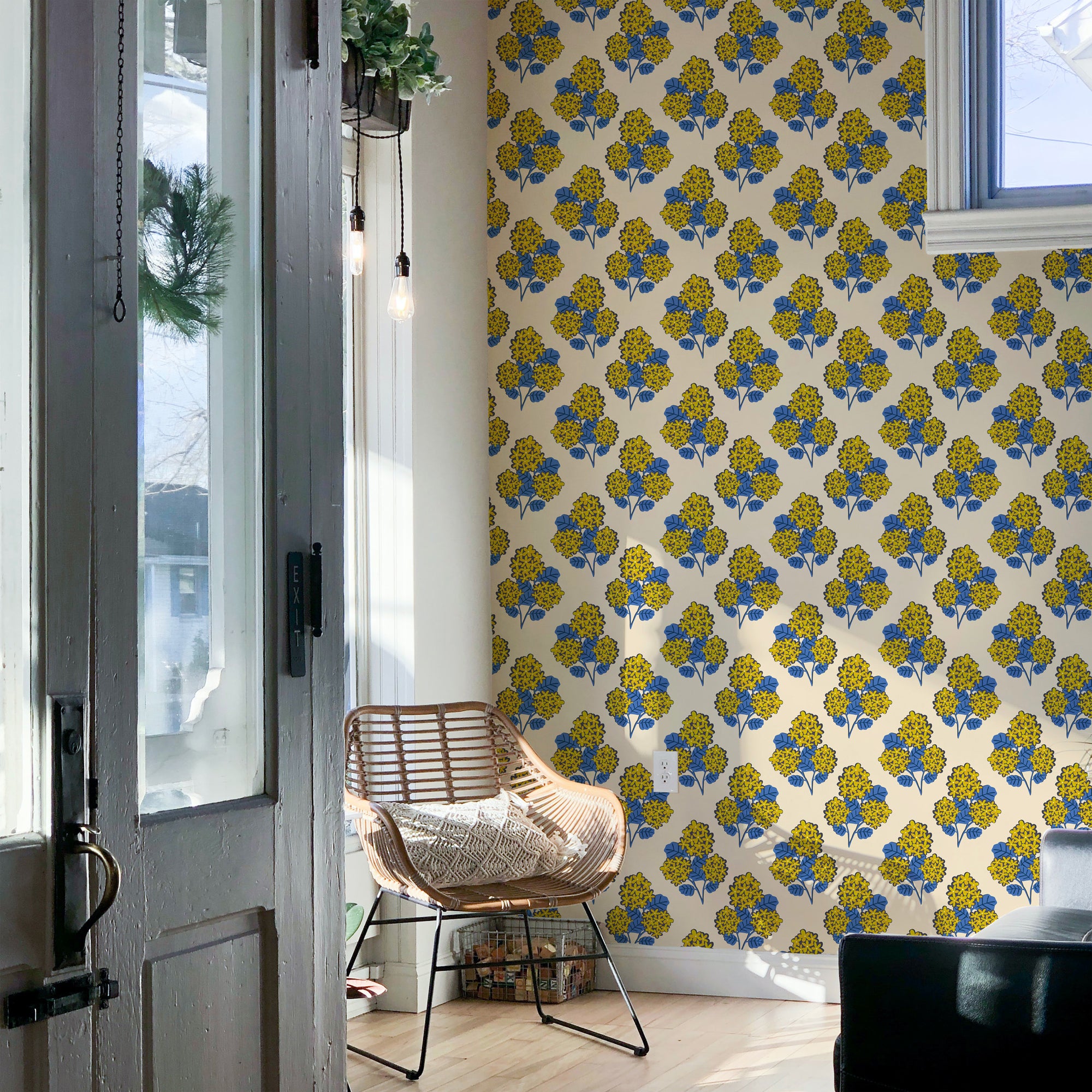 Geranium Bouquet (Cream) wallpaper showcasing vibrant floral patterns on a smooth surface, ideal for modern home decor.