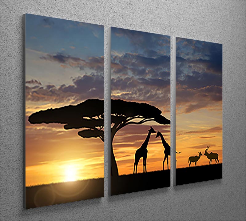 A stunning 3-panel canvas print featuring giraffes and kudu at sunset, showcasing vibrant colors and serene wildlife scenery.