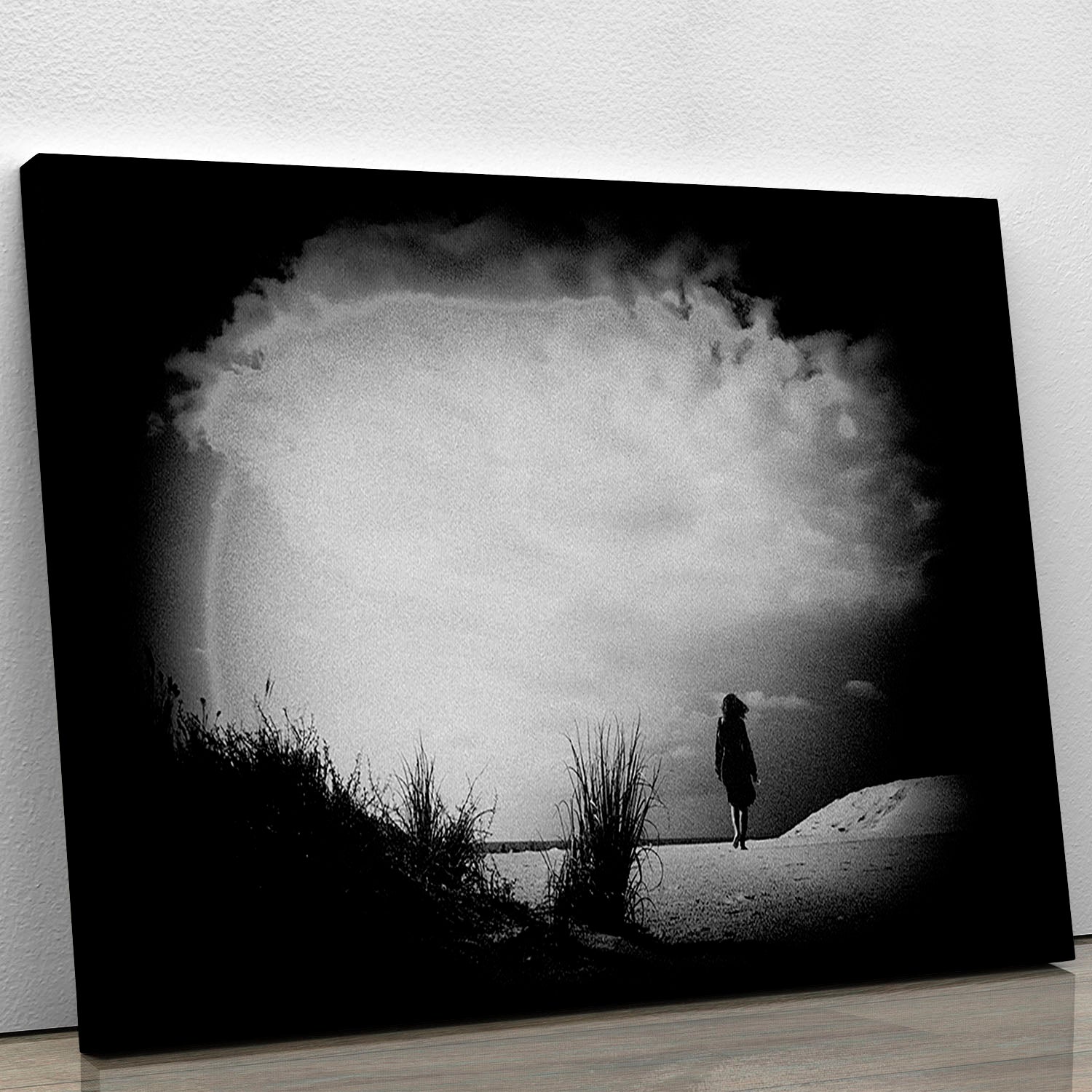 A beautiful canvas print featuring a girl on the beach, capturing the essence of tranquility and elegance in a coastal setting.